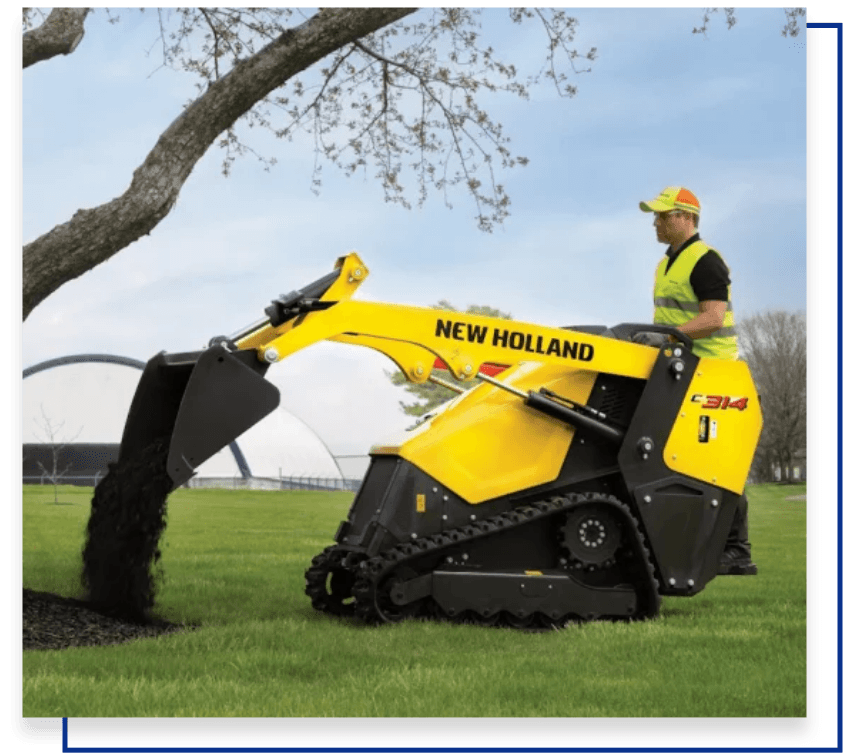 Mini chargeuse sur chenilles New Holland C314 en action, compacte et puissante, idéale pour travaux agricoles et de construction.