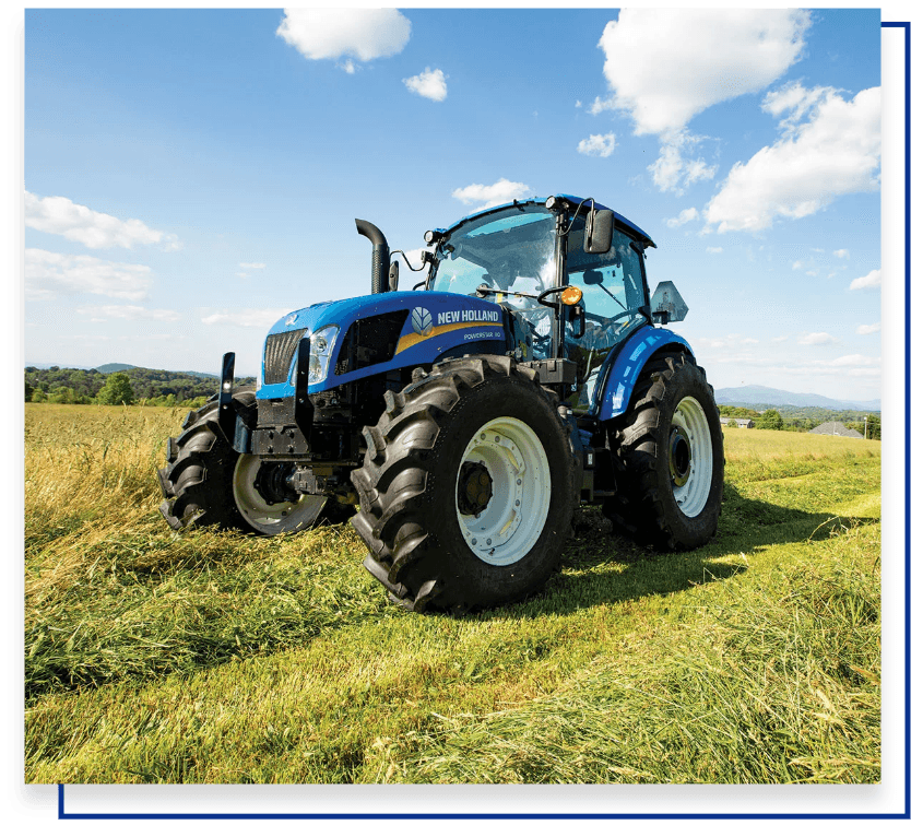 New Holland PowerStar™ tractor in action, showcasing its versatility and operator comfort for various farming tasks.